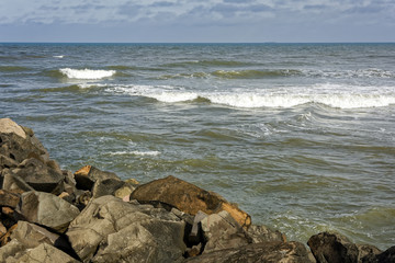 Encounter between the sea, the rocks and the horizon