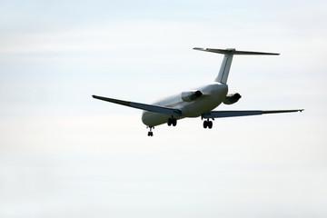 passenger jet plane flying in the blue sky