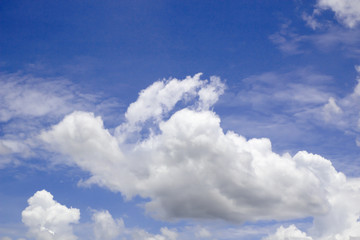 Beautiful white clouds with blue sky background