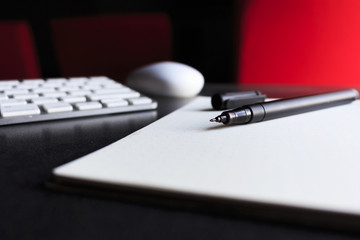 office workplace with a computer pc and keyboard on the over light reflecting table, soft-focus in the background