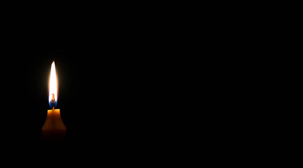 Orange Candle in the Dark
