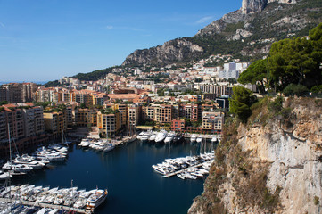 Fototapeta premium Cityscape of Monaco,view to bay with yacht and mountains