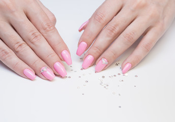 Perfect manicure and natural nails. Attractive modern nail art design. Gel polish applied.