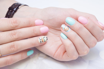 Perfect manicure and natural nails. Attractive modern nail art design. Gel polish applied.