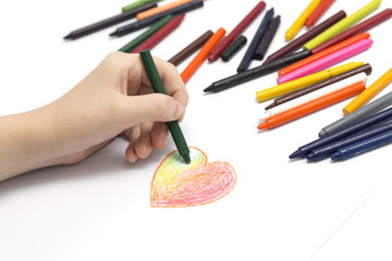 Naklejka premium Hand drawing heart with crayon, with white background