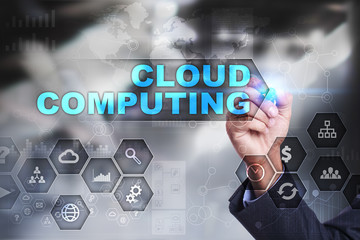 Businessman is drawing on virtual screen. cloud computing concept.