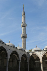 Fototapeta na wymiar Minaret and interior court of Blue Mosque, Istanbul, Turkey