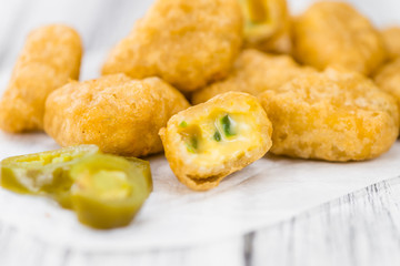 Cheese Nuggets (with Chilis) (selective focus, close-up shot)