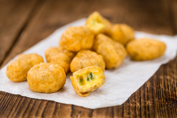 Cheese Nuggets (with Chilis) (selective focus, close-up shot)