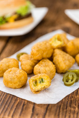 Cheese Nuggets (with Chilis) (selective focus, close-up shot)