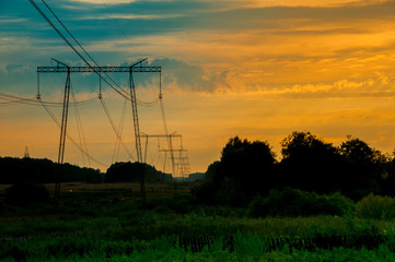 Obraz premium high-voltage line in the field