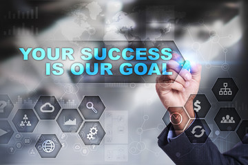 Businessman is drawing on virtual screen. your success is our goal concept.