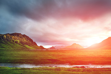 Travel to Iceland. Beautiful Icelandic landscape with mountains, sky and clouds. Trekking in...