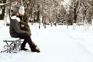 lovers in the park in winter