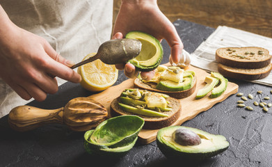 making sandwiches with avocado healthy organic food