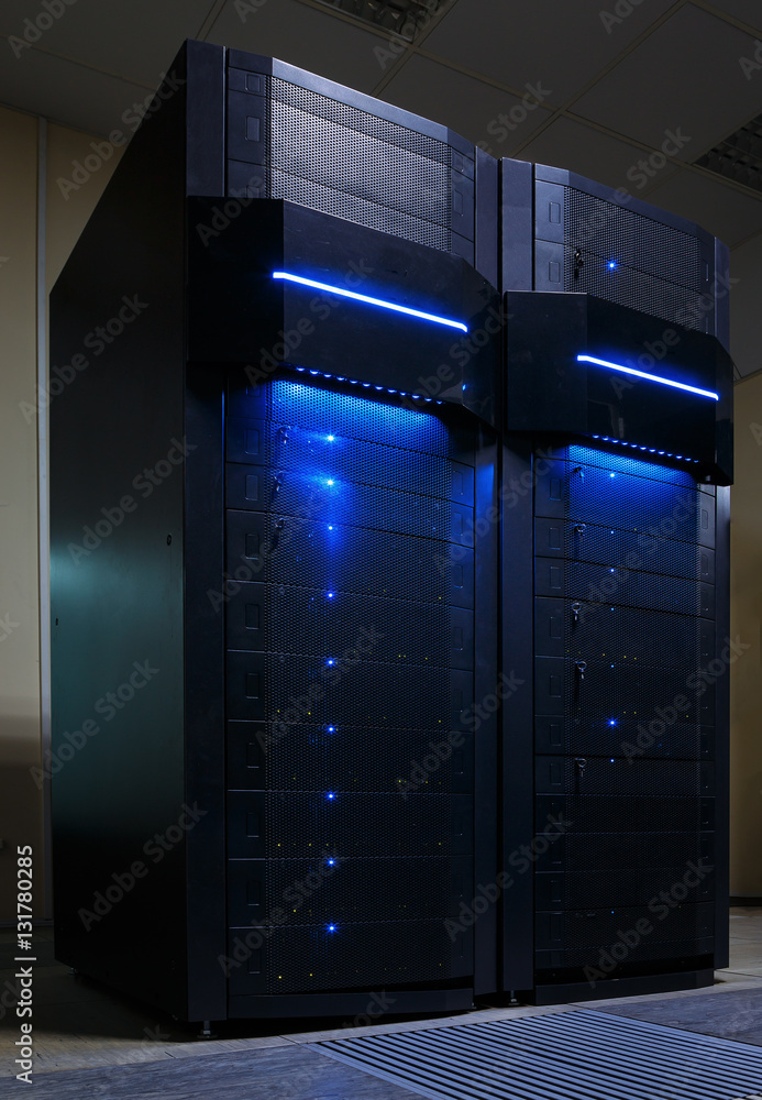 Poster stand mainframe in data center with light glare