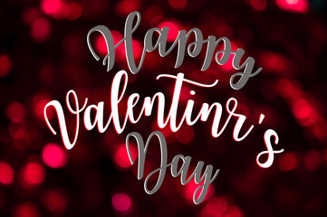 Word Happy valentine's day text on bokeh red and pink colors defocused circular background.

