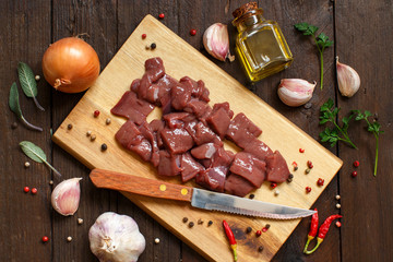 Raw beef liver with spices, herbs  and vegetables