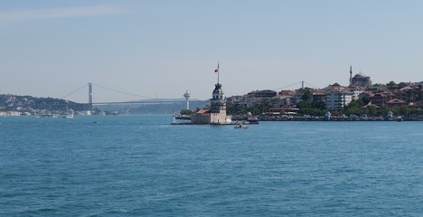 Fototapeta na wymiar Maiden's Tower - also known as Kizkulesi or Leandertower - in Istanbul, Turkey with Bosphorus Bridge