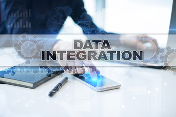 Businessman working in office, pressing button on virtual screen and selecting data integration.