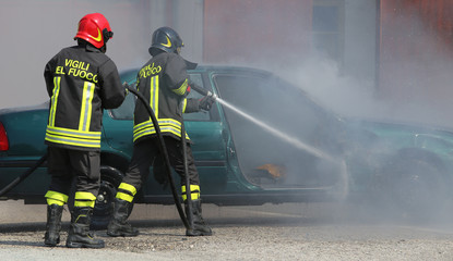Italian firemen extinguished the car fire after the car accident