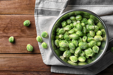 Brussels sprouts in metal bowl on napkin