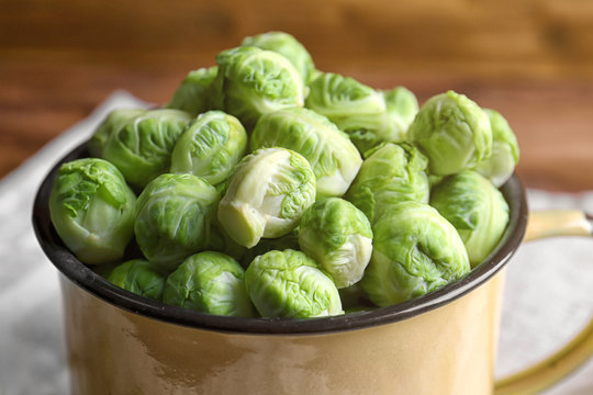 Brussels sprouts in mug on napkin