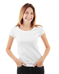 Fototapeta premium Young woman in blank t-shirt on white background