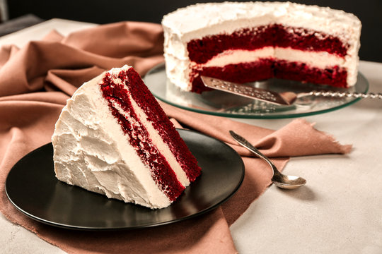 Slice Of Delicious Red Velvet Cake On Plate