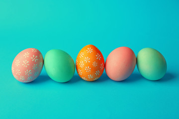 Colorful Easter eggs on blue background