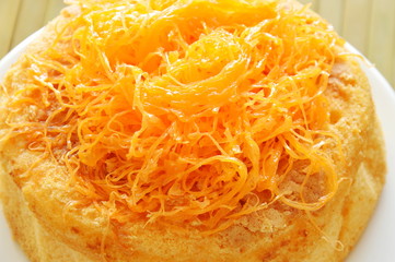 egg golden threads topping butter cake on dish