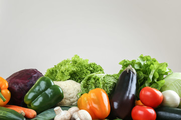 Fresh vegetables on light background