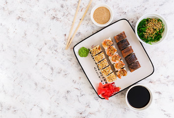 Sushi roll on white background. Top view © aeril