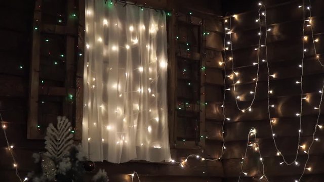 Wooden window with Christmas lights