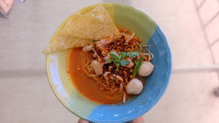 Pink seafood flat noodles