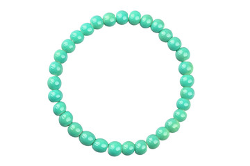 Green round elastic bracelet made of small pearl-like round beads, isolated on white background, clipping path included