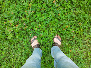 Feet on grass.