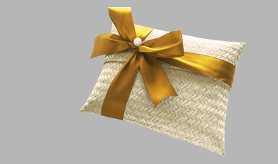 Gift box make by handmade weave, and tied with gold ribbon