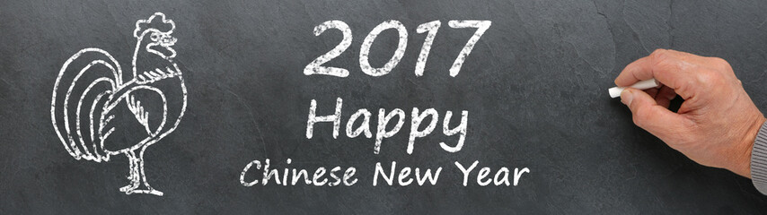 Obraz premium Happy Chinese New Year 2017 on a blackboard