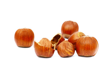 Group fresh hazelnuts isolated on white background