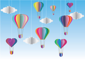 Origami made colorful hot air balloon and cloud.paper art style.