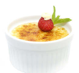 Portion of the cream brulee on a white background