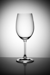 empty wine glass isolated on the light gray background