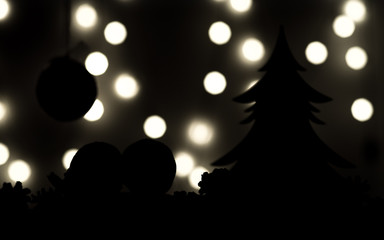 silhouettes Christmas tree, tangerines on dark background and lights in blur