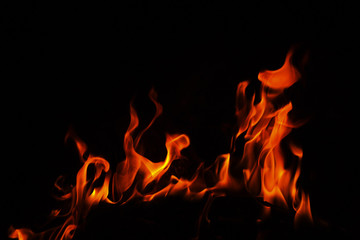 Obraz premium Fire flames on black background.