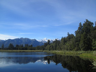 Fototapeta na wymiar Reflection on Mirror lake/ Lake Matheson New Zealand