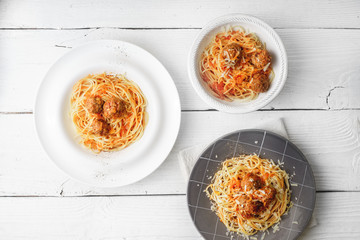 Spaghetti with meatball  on the white wooden table top vie