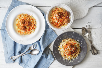 Spaghetti with meatball  on the white wooden table horizontal