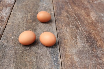  egg select focus with shallow depth of field on wood background
