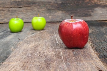 Red  Apple Close up, on wooden background 